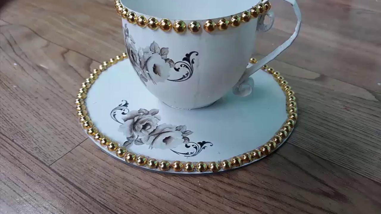 LINDA!!!!   XÍCARA EFEITO PORCELANA FEITA DE GARRAFA PET E CD