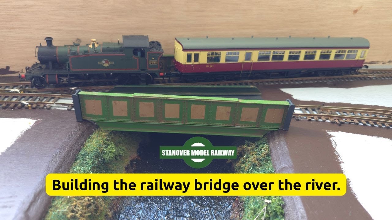 Building the railway bridge over the river.