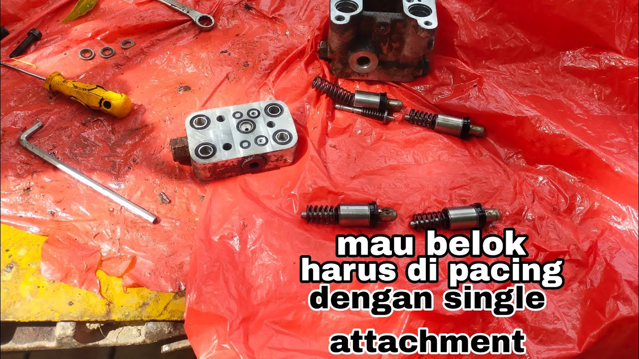 peyebab track kiri lemah pada excavator komatsu pc200-7