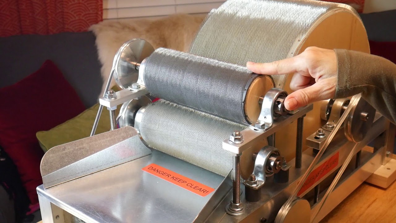 Brother Super card triple drum carder with  Mary Egbert Camaj School of Fiber ARts