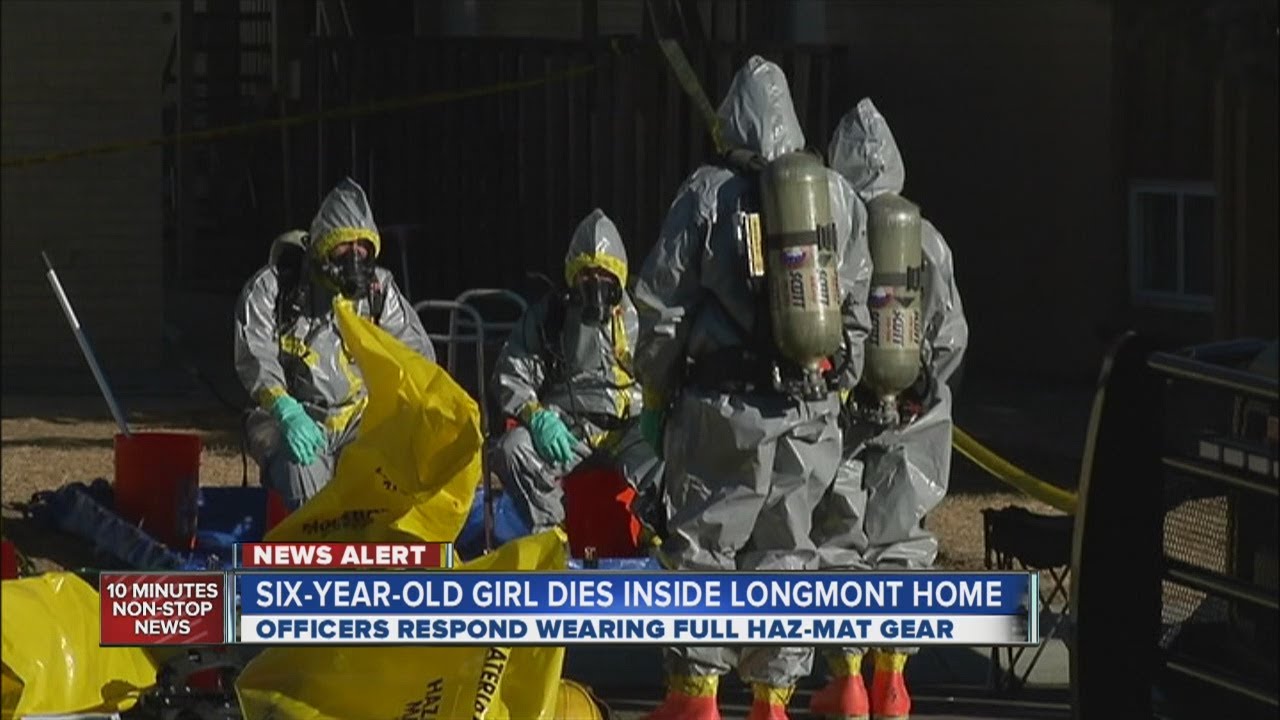 Officers in Hazmat suits respond to flu-like death