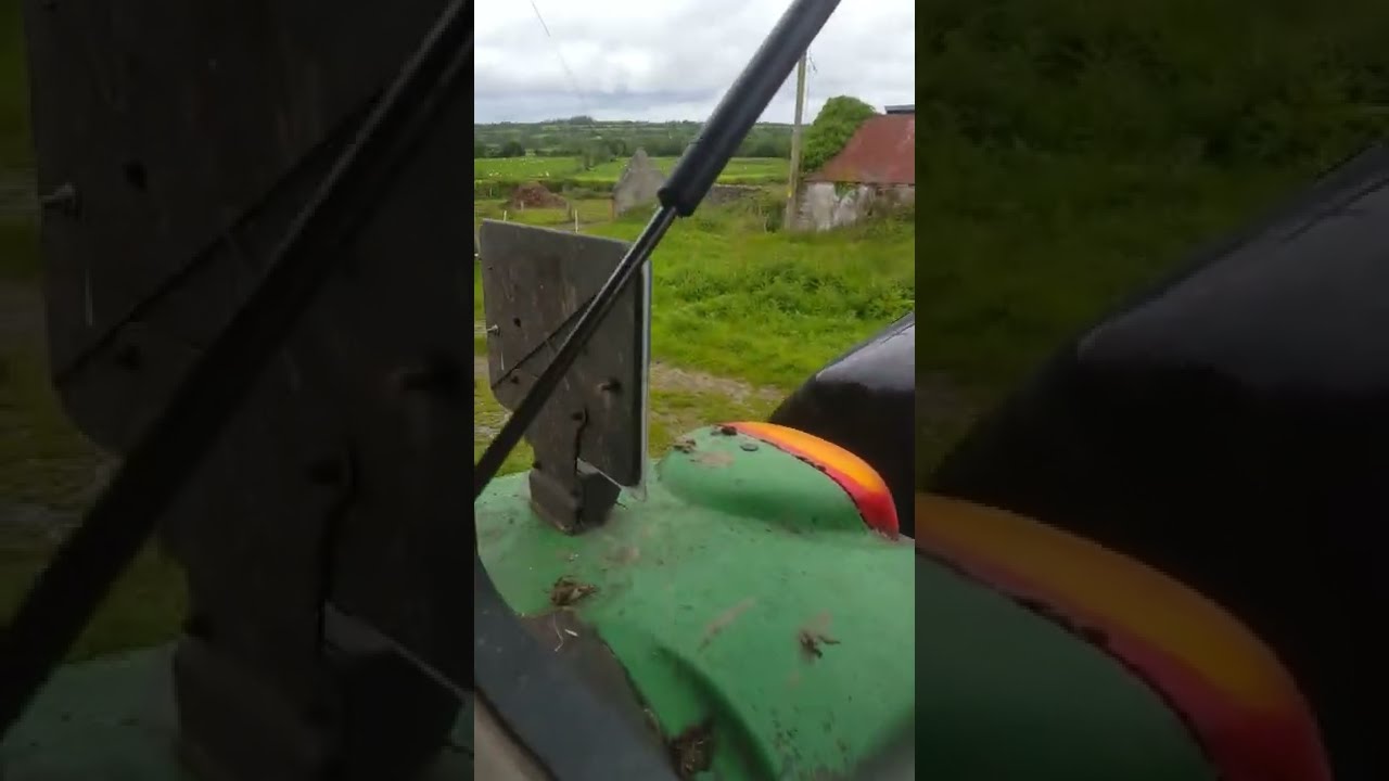 John Deere 6320 stacking silage bales Laois