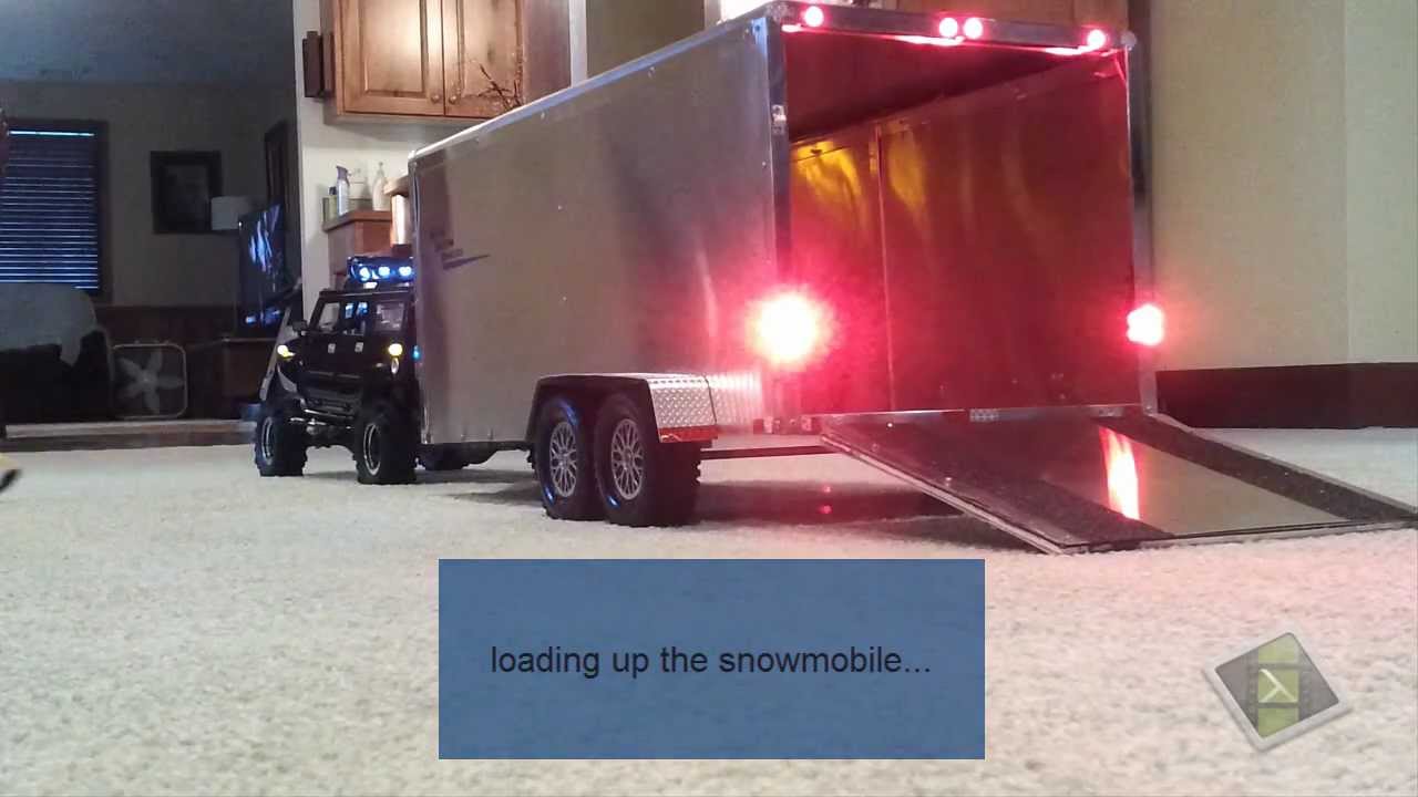 my custom h2 pulling a cargo trailer
