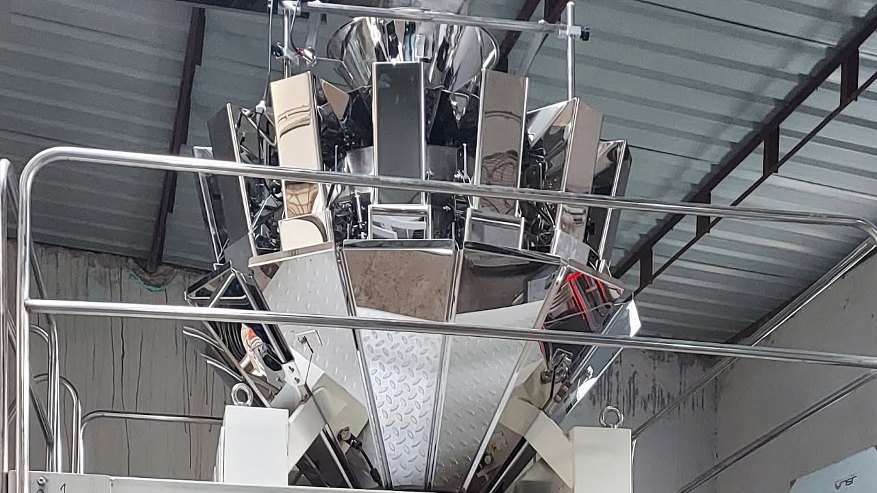 High speed multi head weigher based pouch packing machine