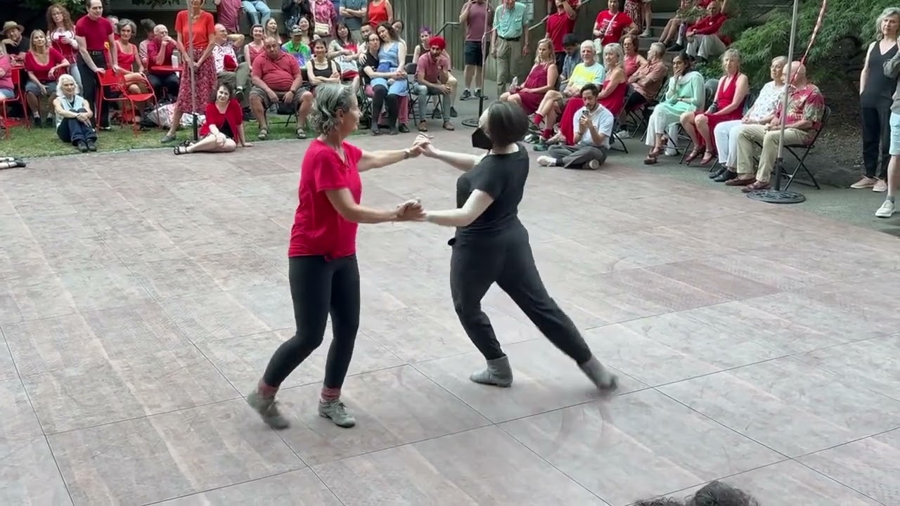 Lilli Ann and Claire Carey demo Cross -step Waltz at Dancing til Dusk in Freeway Park