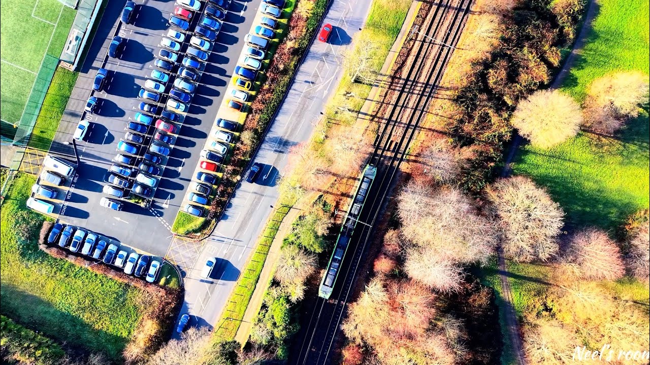 Serene Tram Ride Blended with City Skyline taken with Dji mini 5 pro