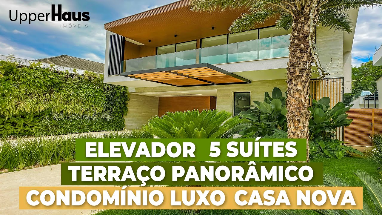 Casa "visitou, apaixonou" na Barra da Tijuca. Elevador, terraço panorâmico, projeto Sergio Klein