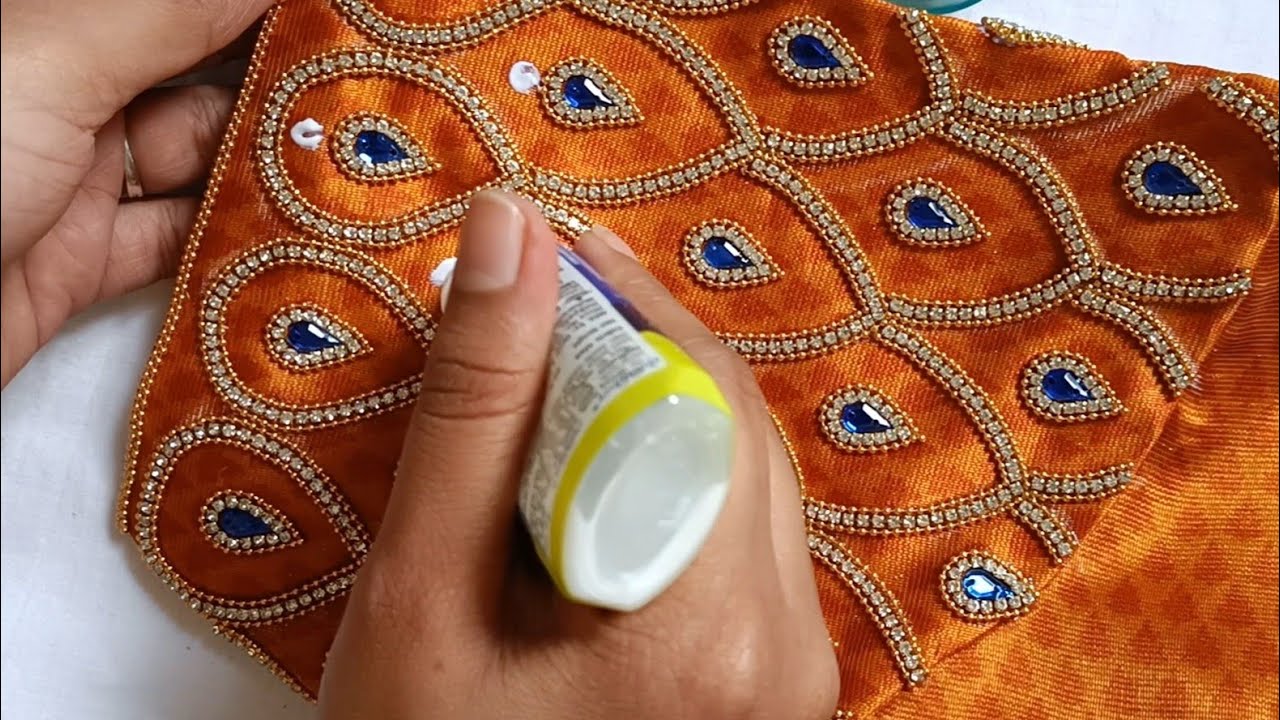 Very Grand looking Aari work Bridal Blouse design with normal needle on stitched blouse|maggam work