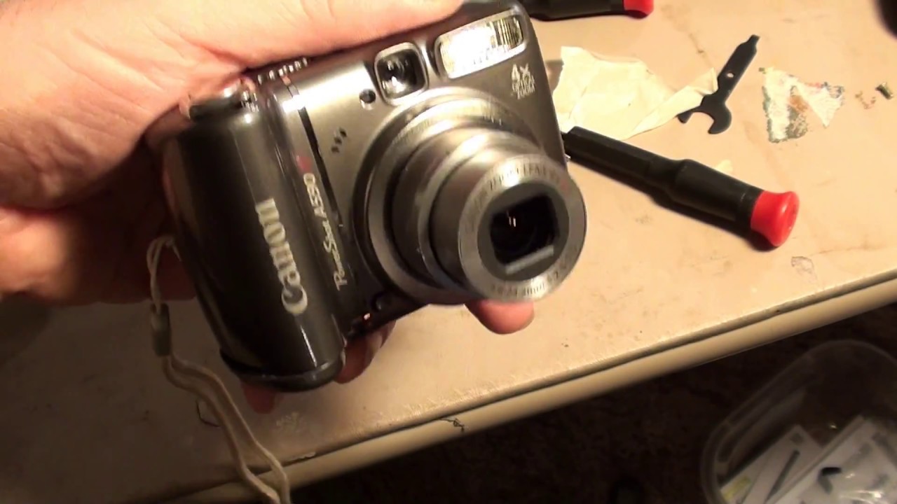 Digicam Repair/Battery Door Latch