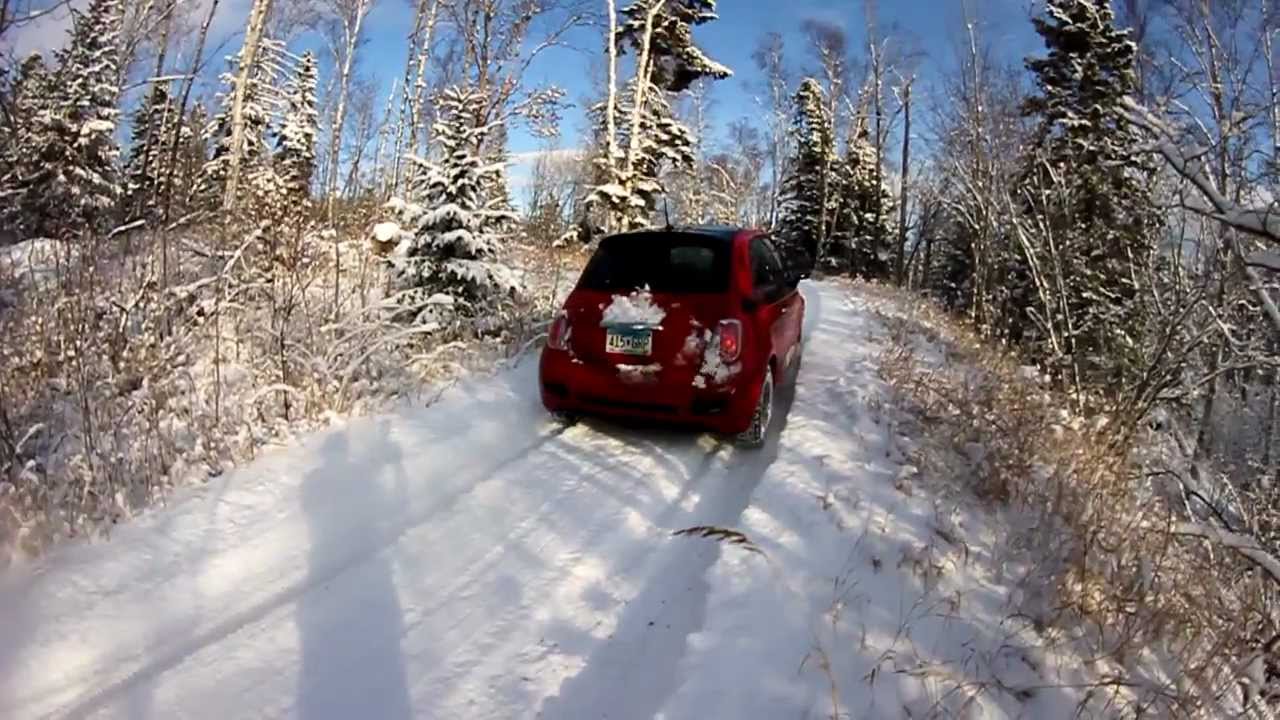 2012 fiat 500 driving out a steep icy drive way with 7 inches of fresh snow.