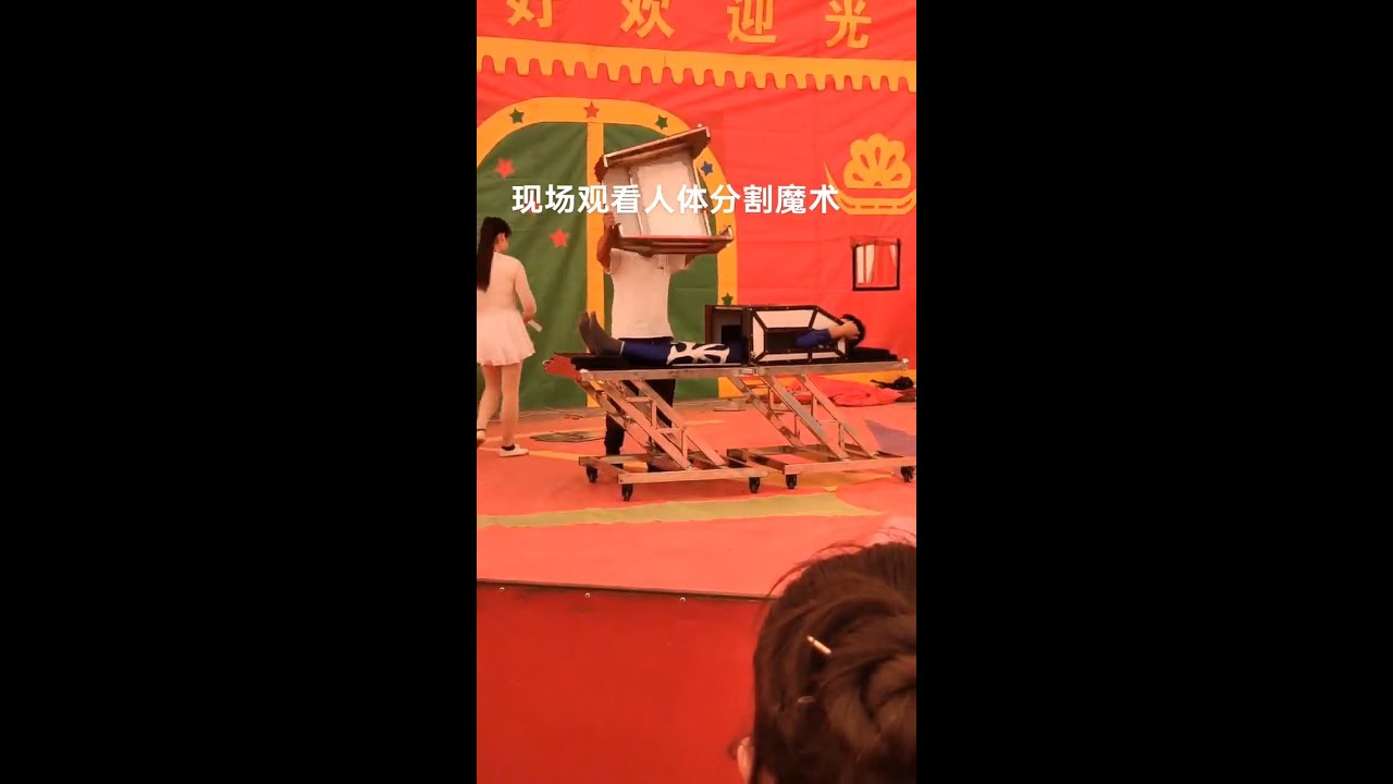 Sawing a man in half