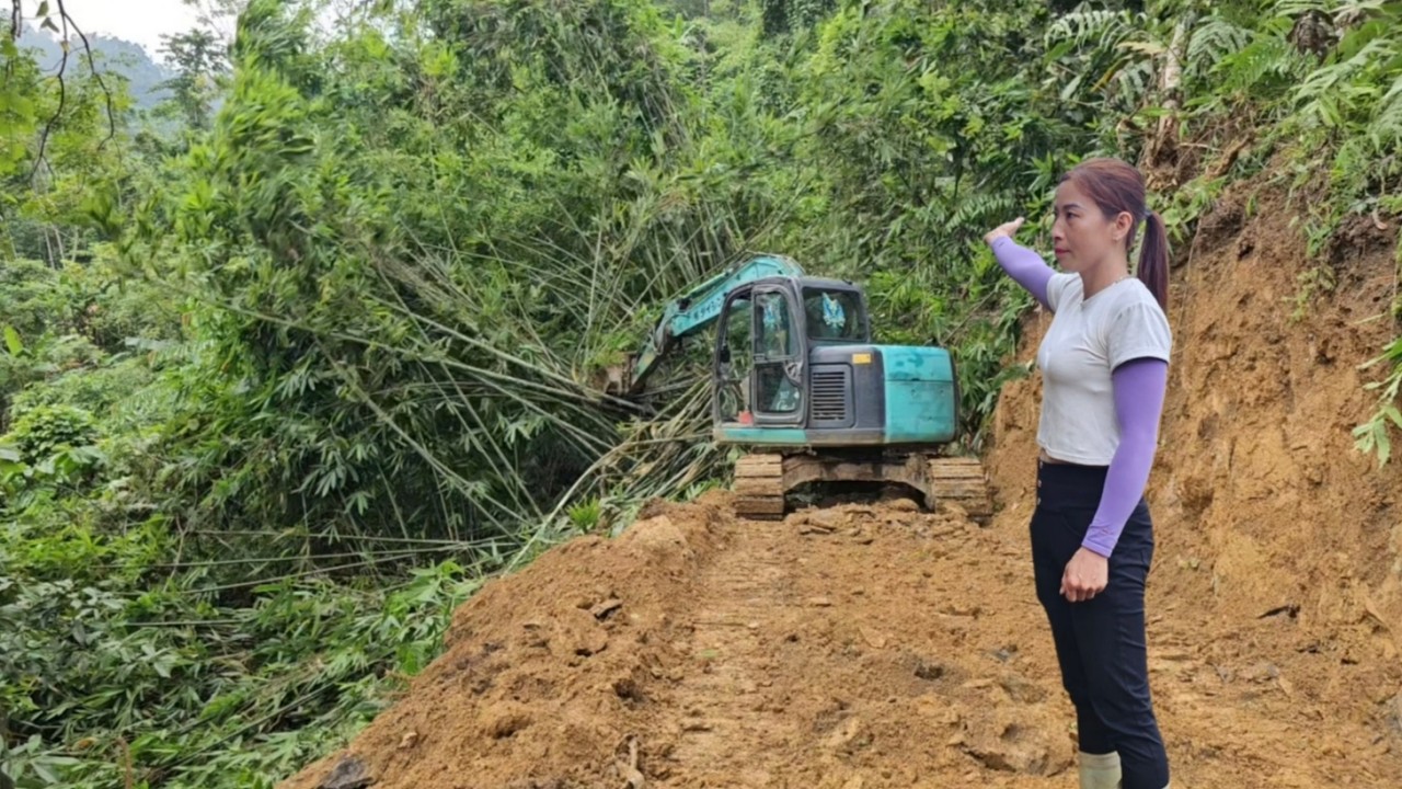 How excavators break rocks and dig earth to build roads up the hill.