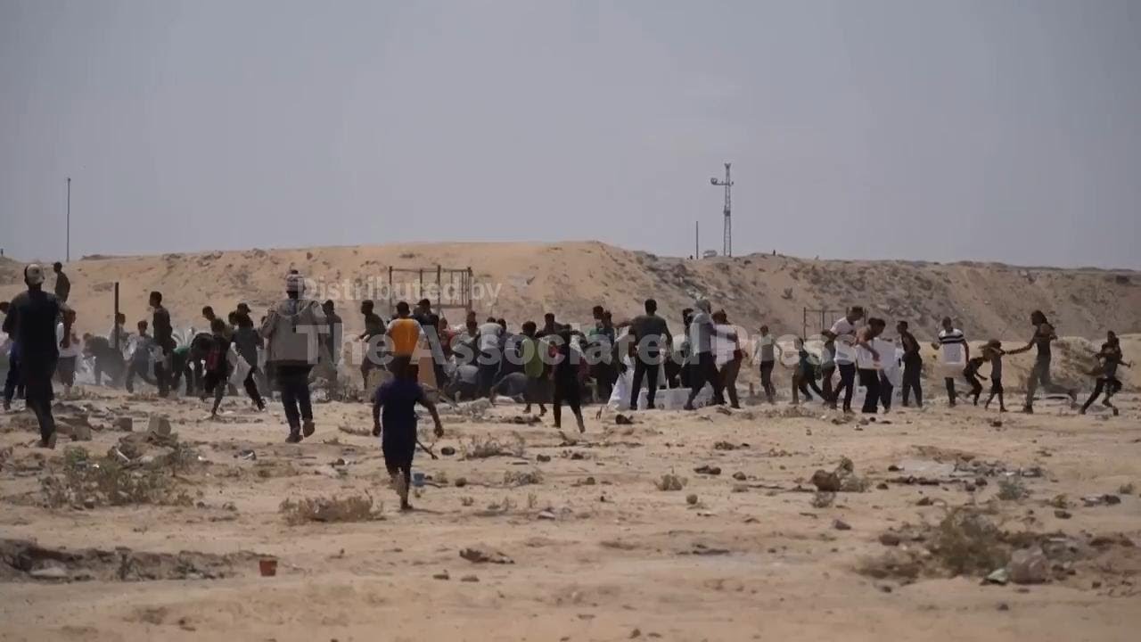 Airdrops continue over Gaza as Palestinians scramble to collect aid and food for their families