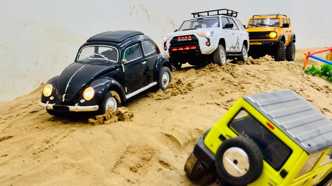 Toyota Fortuner VW Beetle Ford Bronco off Road climb obstacle ￼