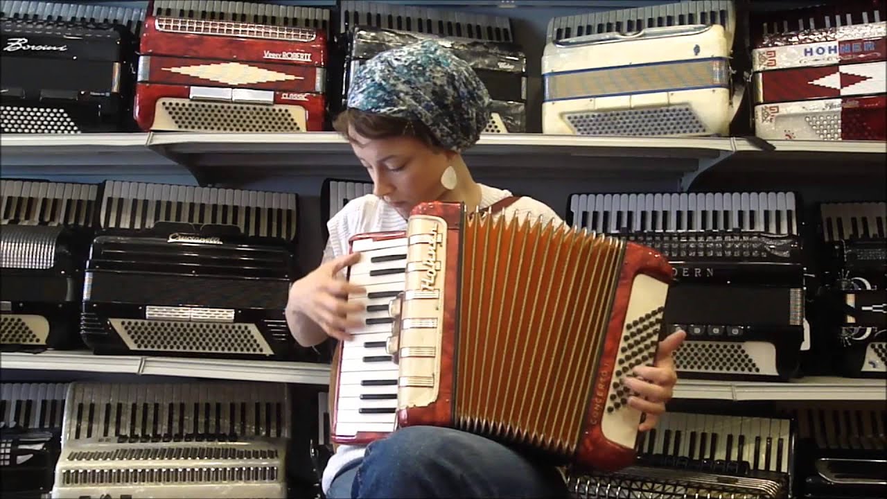 1384 - Red Hohner Concerto IM MM 48 $795