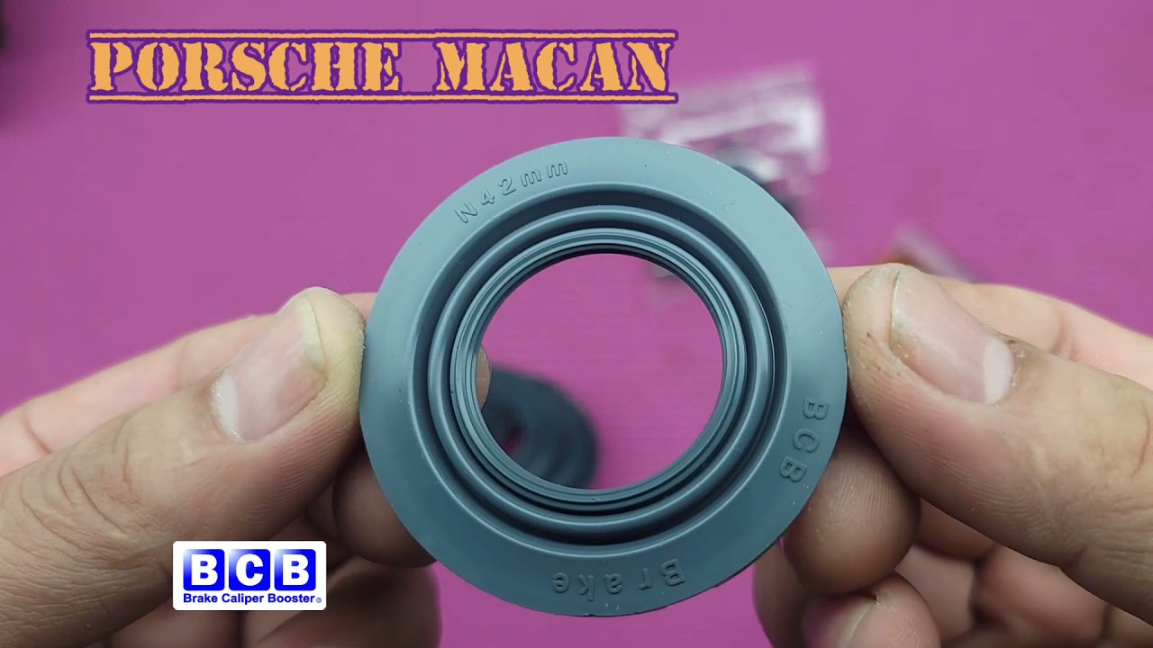 Scheduled maintenance Porsche Macan front brake caliper.