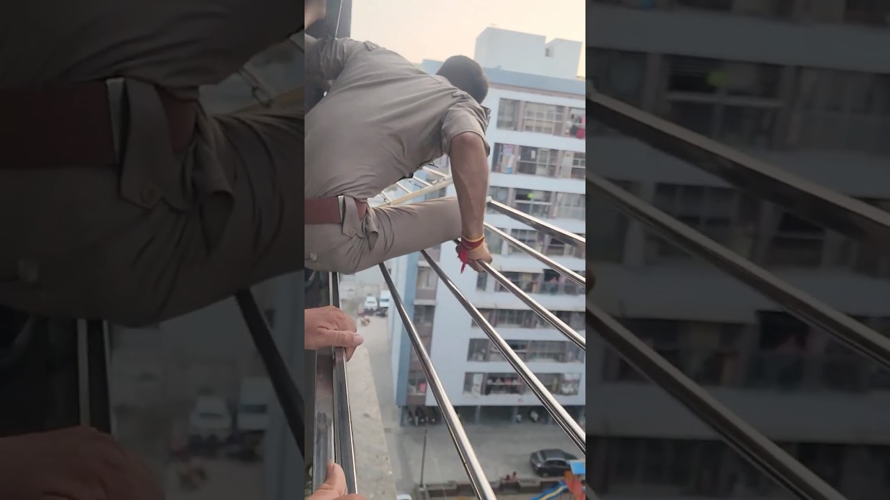Surat cop risks own life to rescue man inside 7th-floor flat