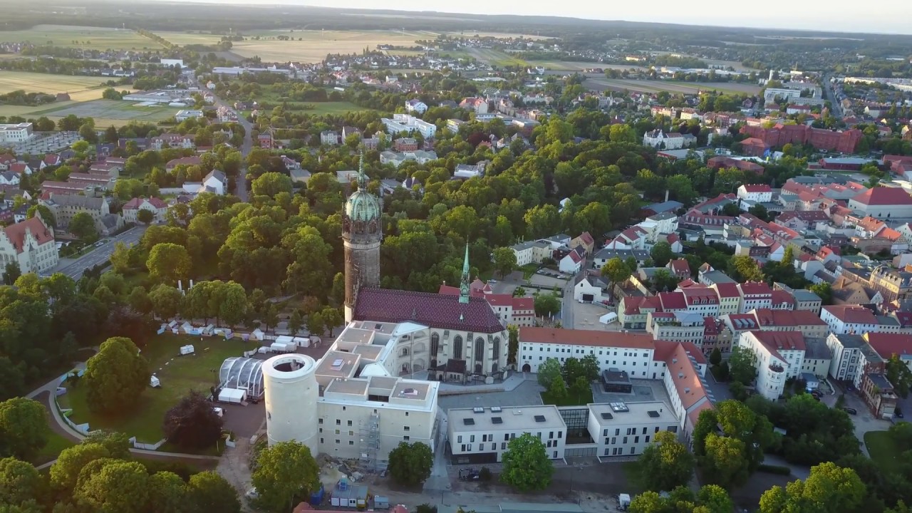 Wittenberg, Germany - Drone footage overview & Flying away over Elbe