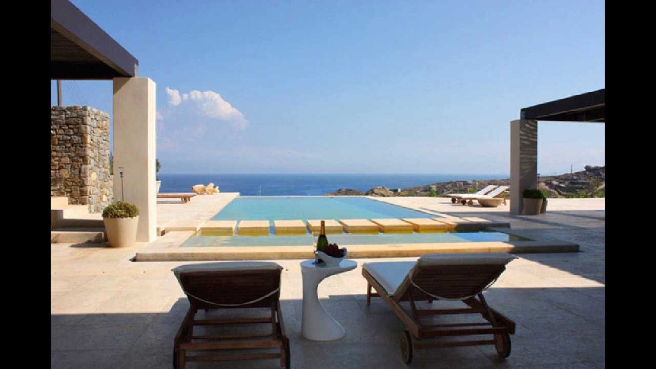 Mykonian architecture luxury villa with breathtaking sea view .
