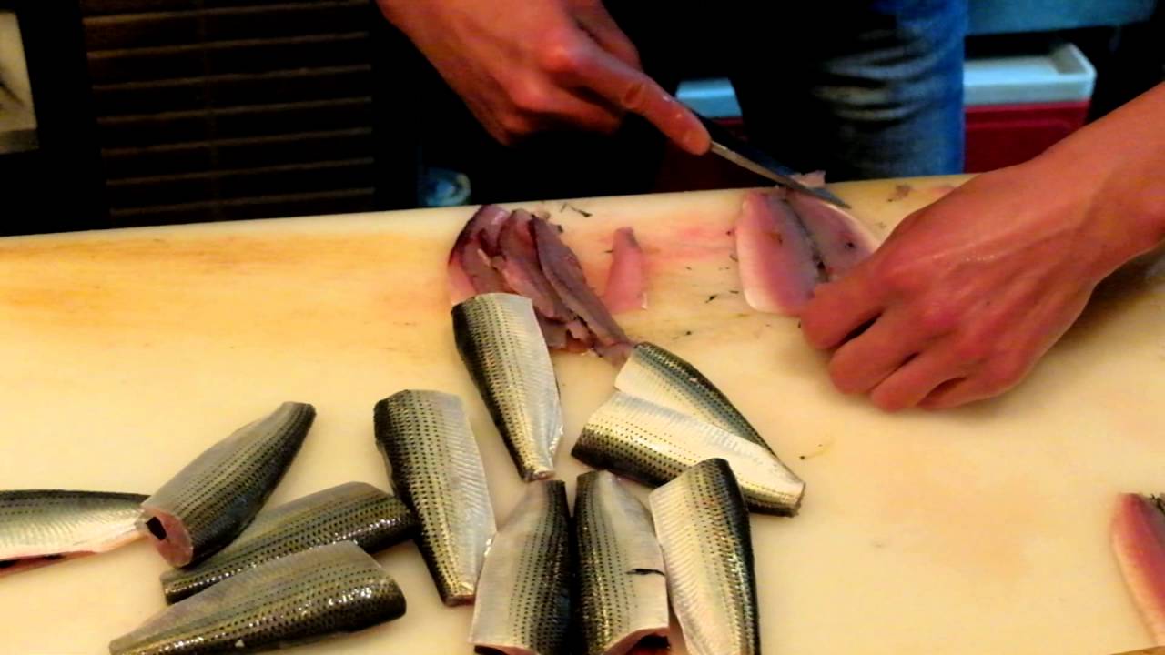 Hayashi san. Sushi sensei. Cleaning kohada.