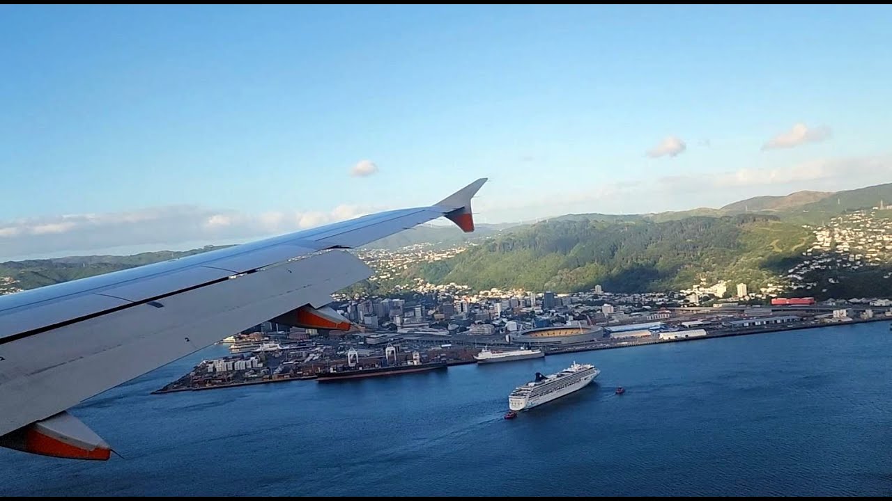 MORNING LANDING AT WELLINGTON AIRPORT WITH CITY VIEW