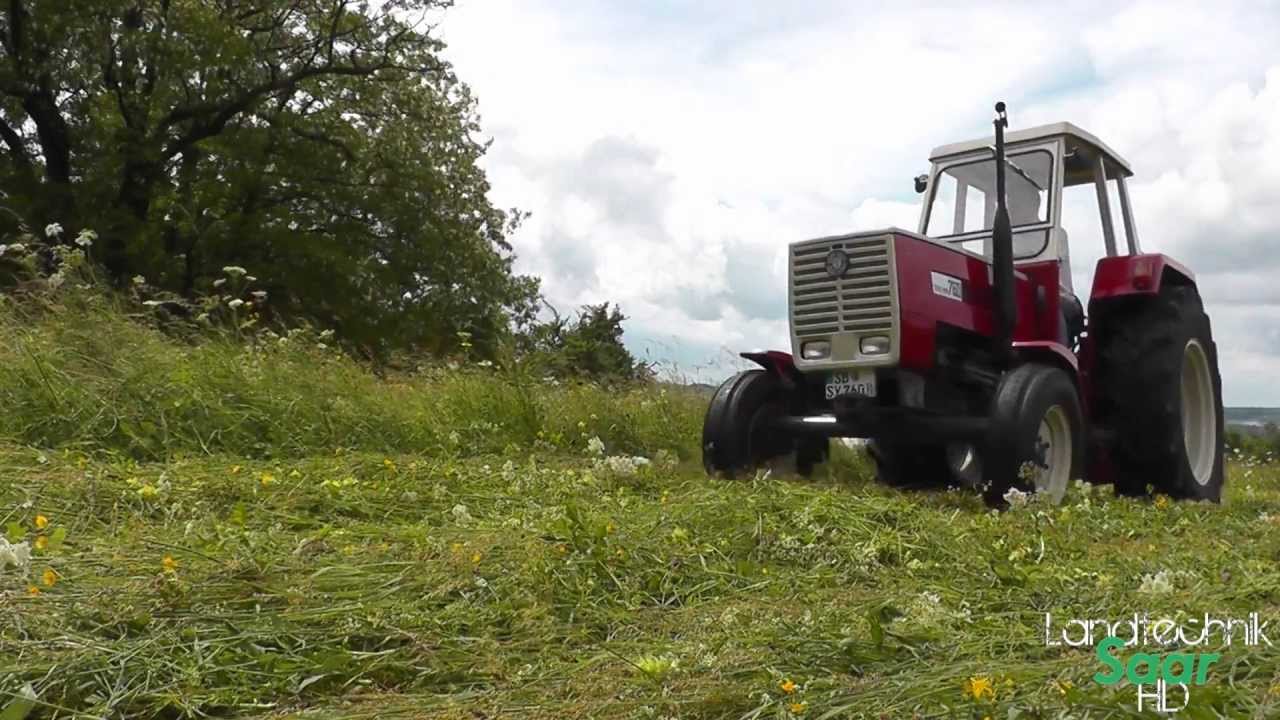 Gras Mähen mit Steyr 760 und Kuhn GMD Select 44