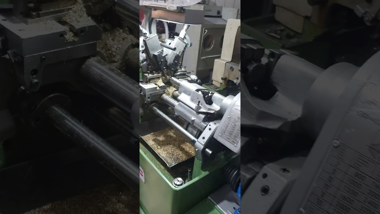 Torno automatico traub BGSE A25 produzindo porca Calota SERVITEC AUTOM&Aacute;TICOS