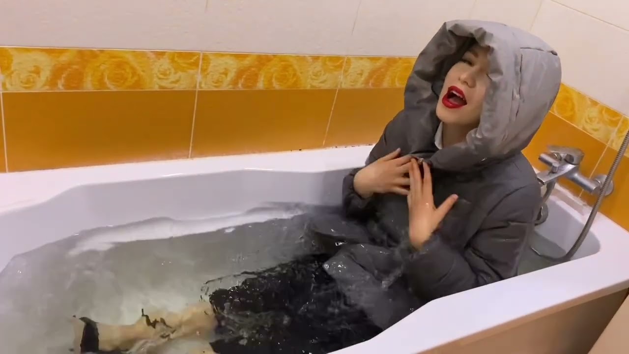 Wetlook in big winter jacket / Miss Viki