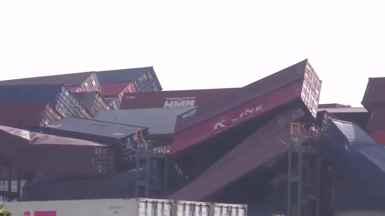 Shipping Containers Heading to Long Beach Fall during Storm