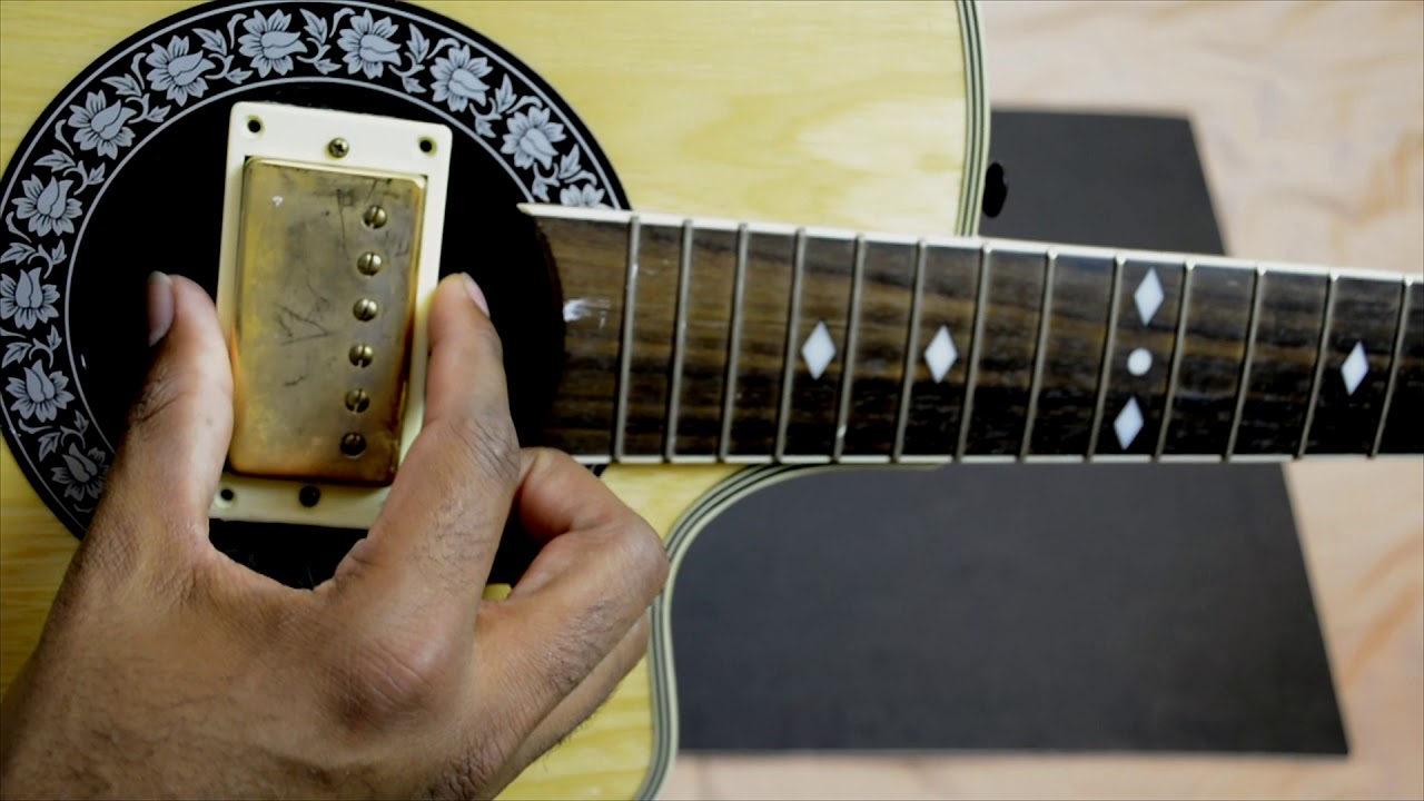 Como Instalar un microfono para guitarra.