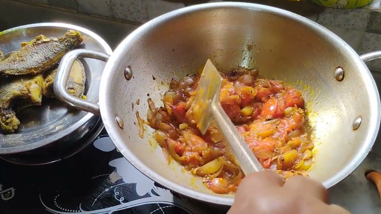 Telapia machher jhaal ghoroya bhabhe