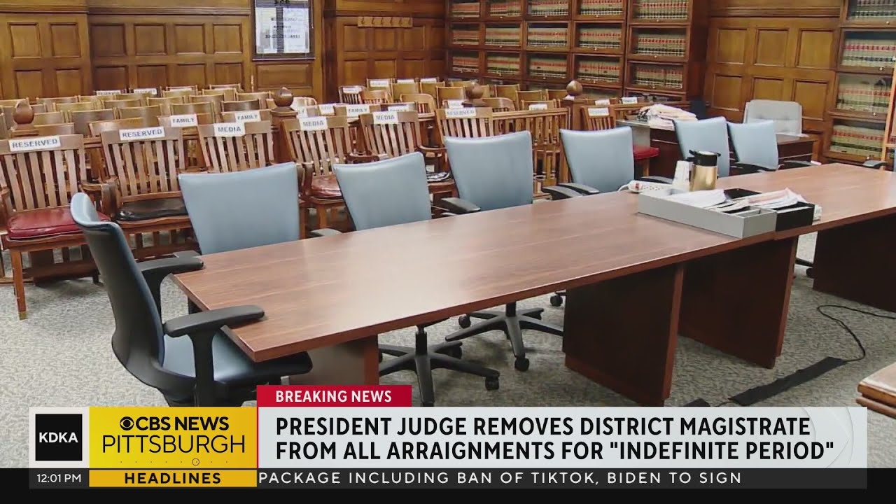 District magistrate removed from hearing arraignments