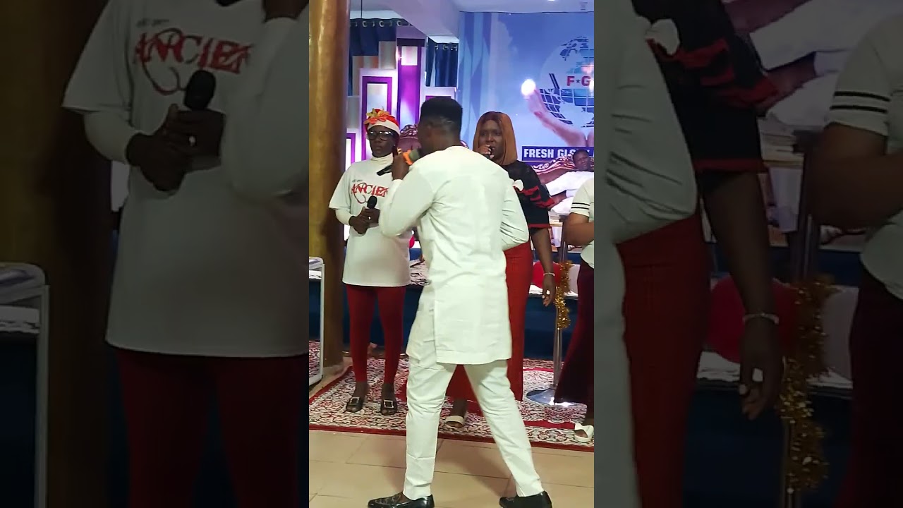 Ministering; Pastor Sam Uche.