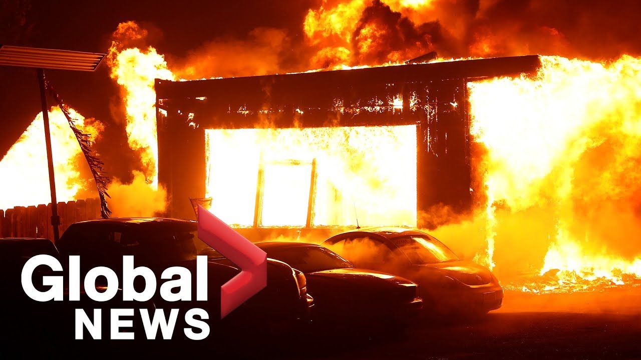 Fast-moving California blazes cause thousands to flee