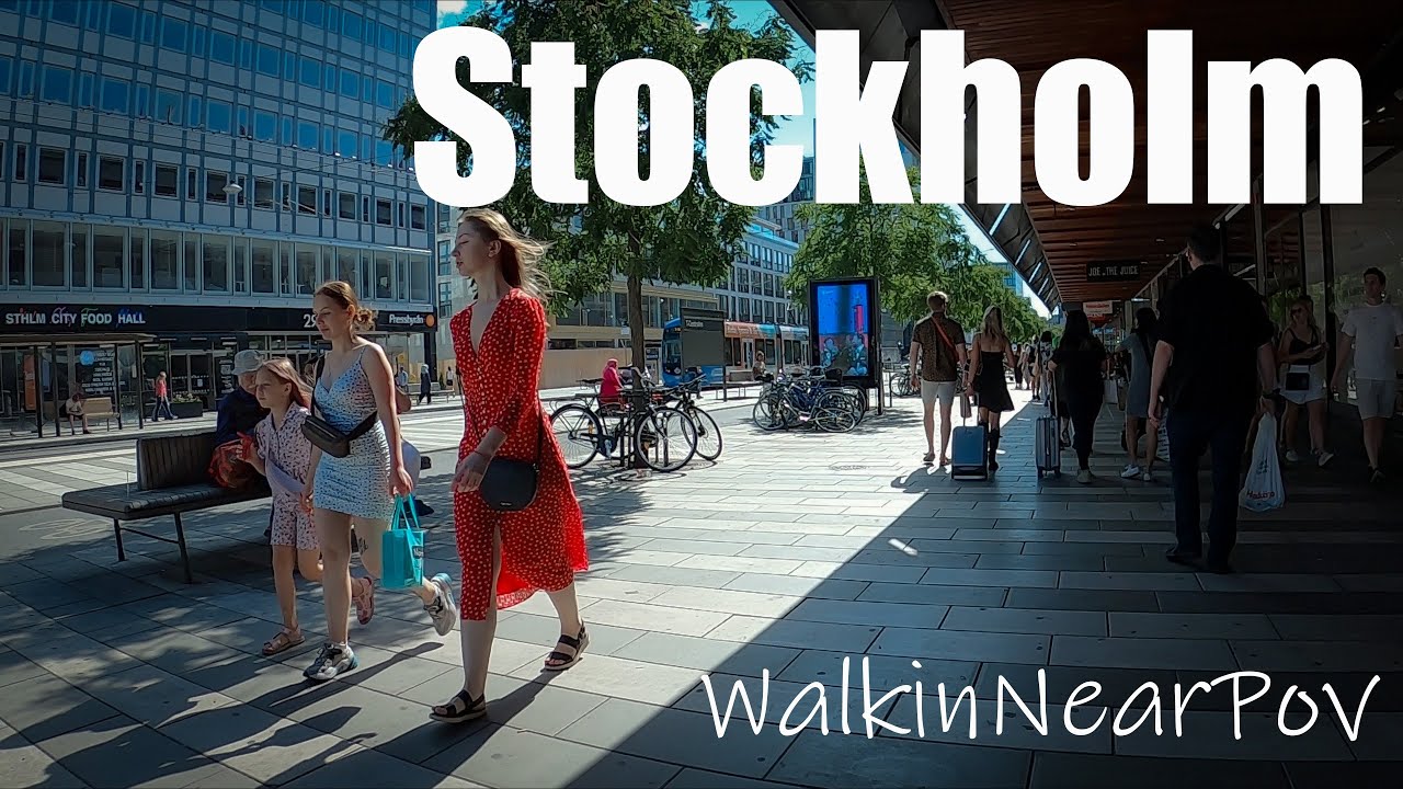 Relaxing afternoon walk in warm Stockholm with the sounds of the city /POV/