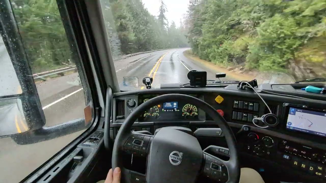 POV Truck Driving. Snow trap. Volvo VNL 760