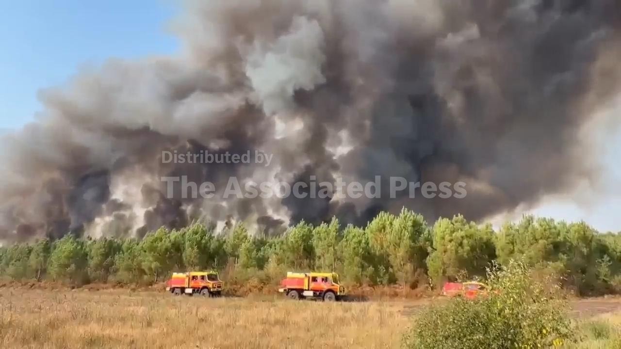 French firefighters continue to battle wildfires in forests west of Bordeaux