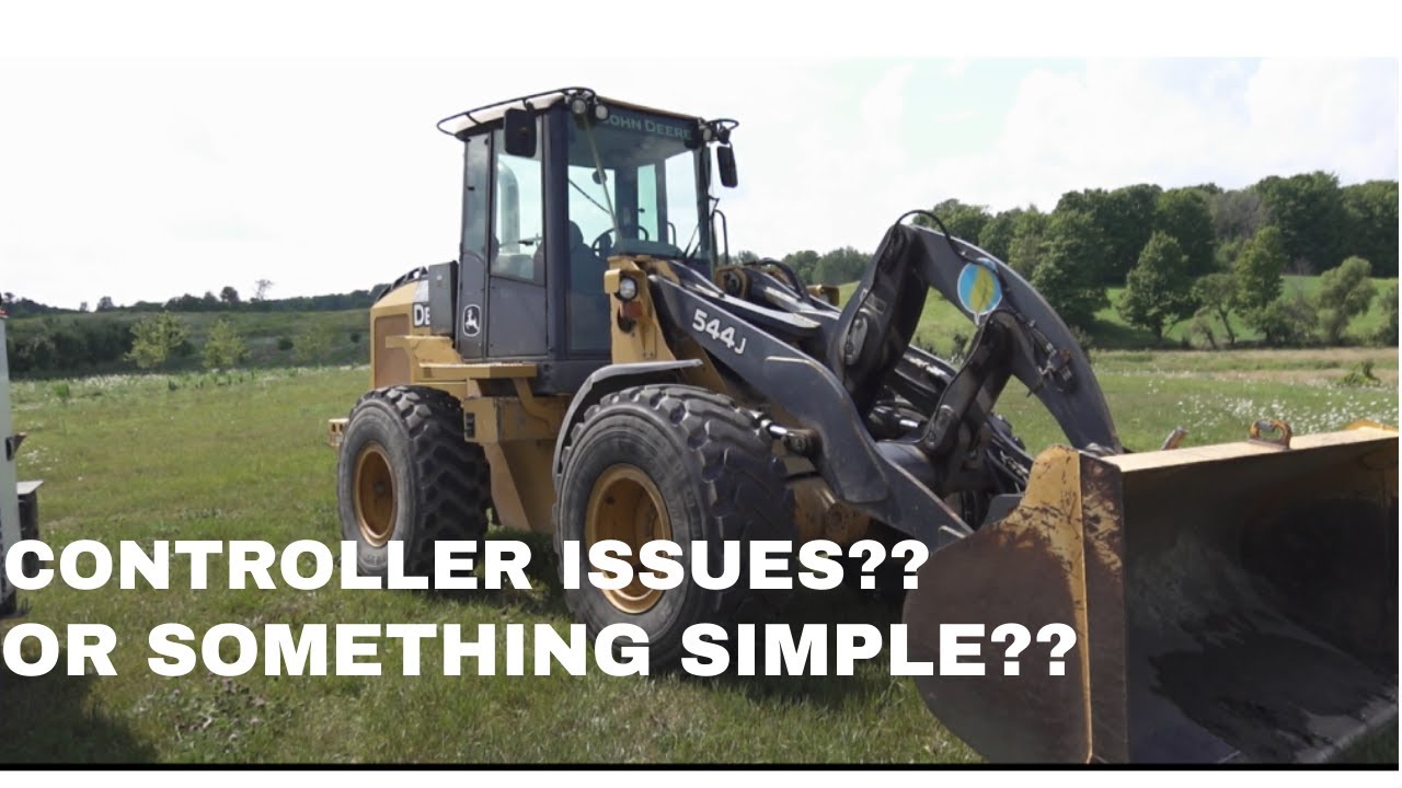 THIS 544J has a "STOP ENGINE" warning light!