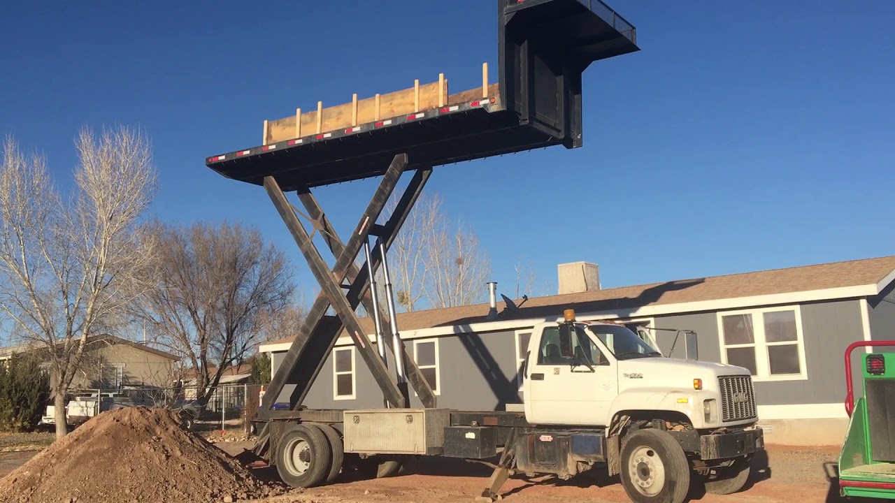 Video 4 Roofing Scissor Lift Flat Bed Dump Truck