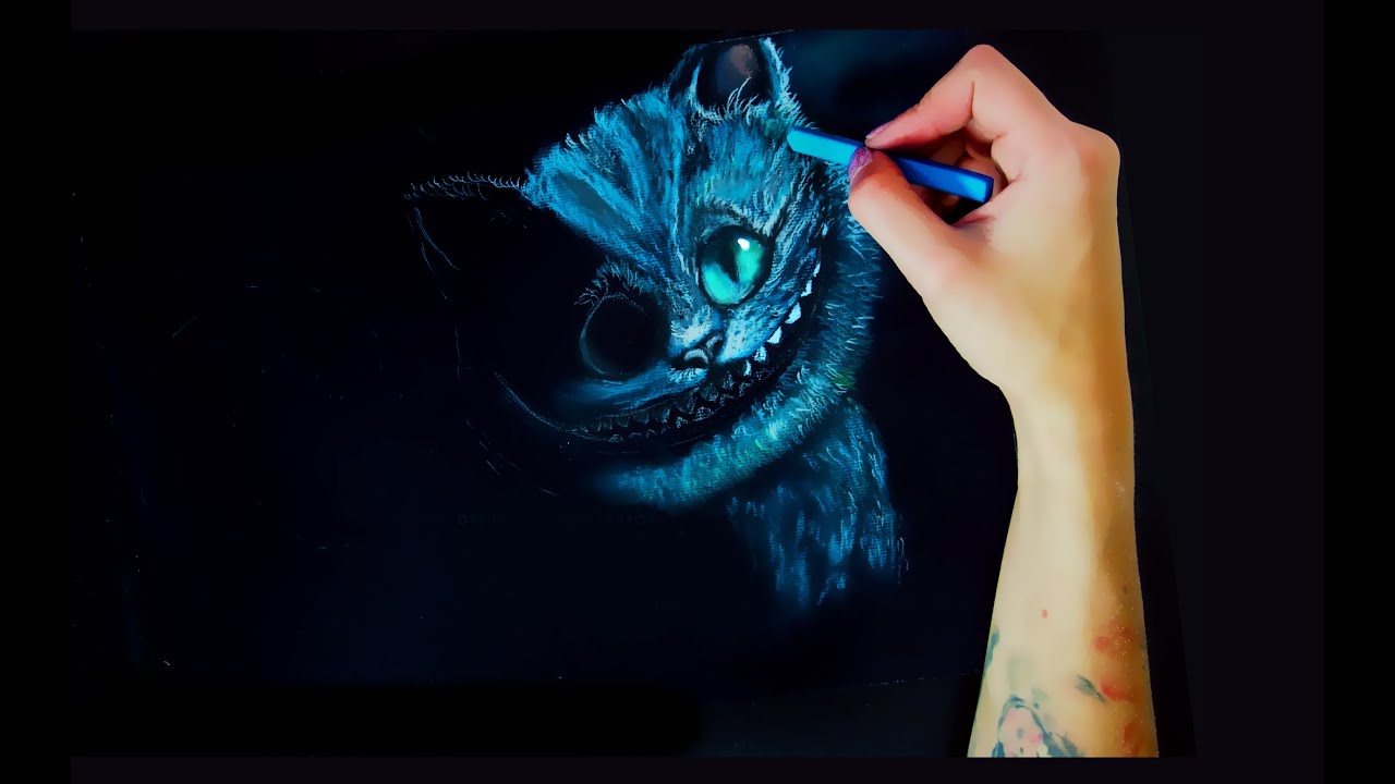 Tim Burton's Cheshire cat drawing on black paper