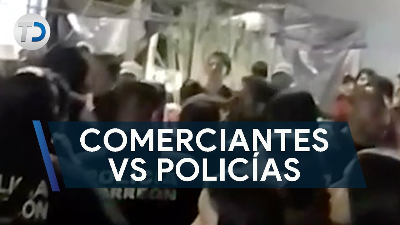 "Un policía me golpeó", riña entre comerciantes y policías causó alarma