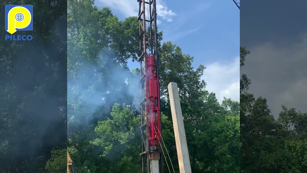 Pileco  Diesel D12 driving square concrete pile.