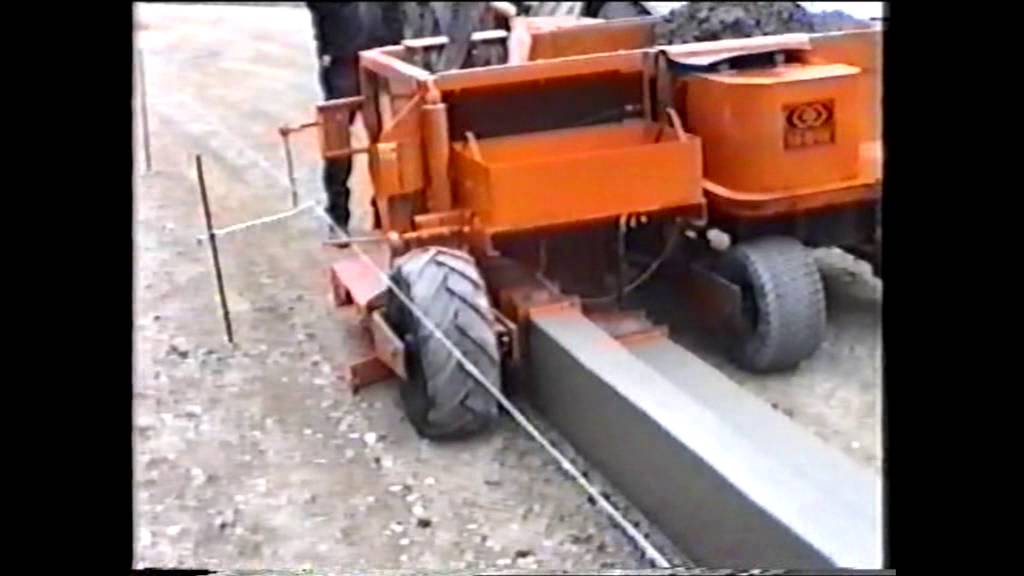 MBW  Concrete Slipform Curb Machine with extension.