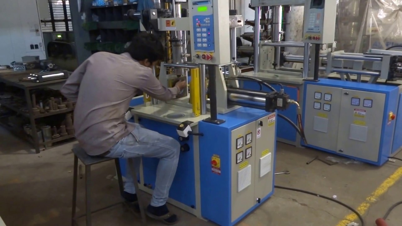 Amrut Brothers Vertical Plastic Injection Moulding Machine