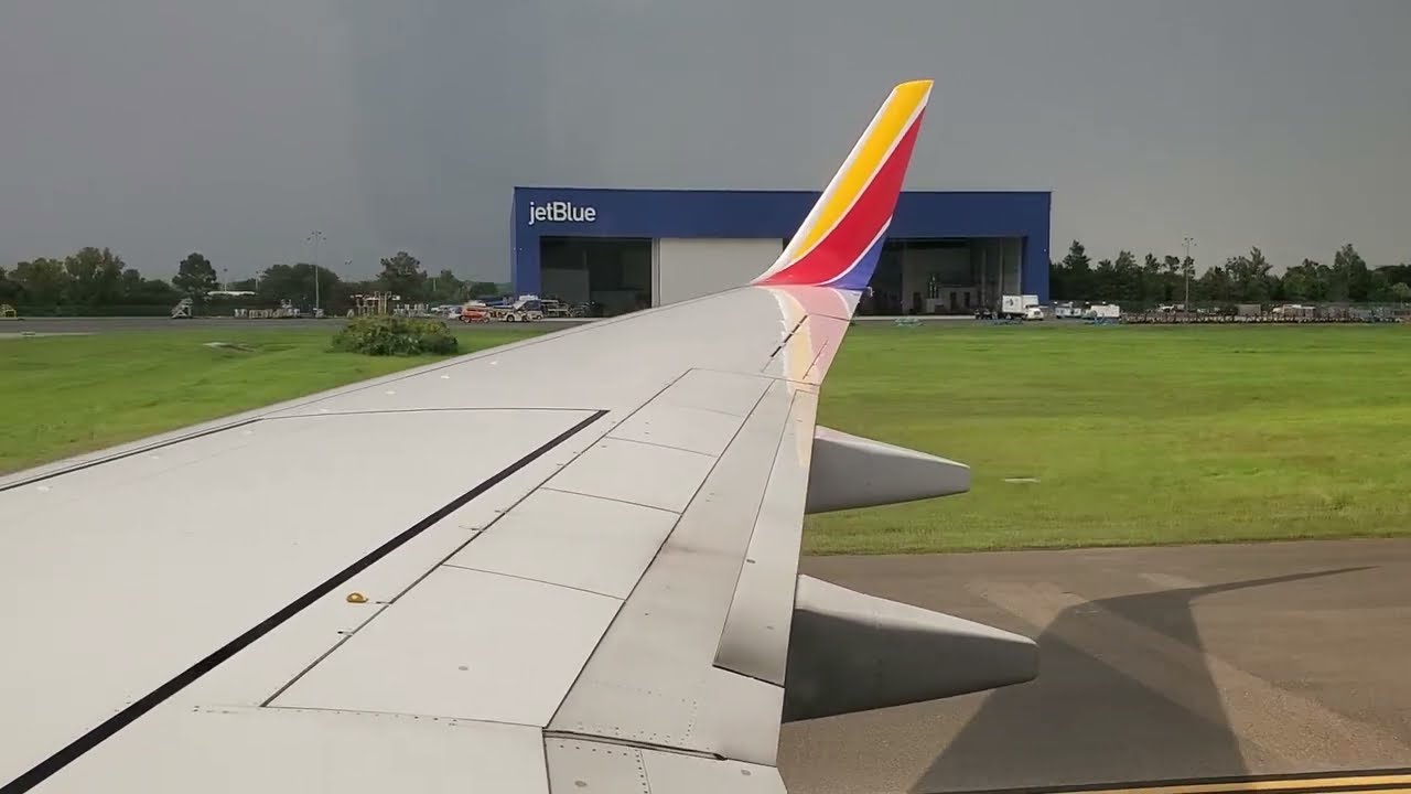 Southwest Airlines (SWA562) B737-700 Landing at Orlando Int. Airport (MCO) from NYC
