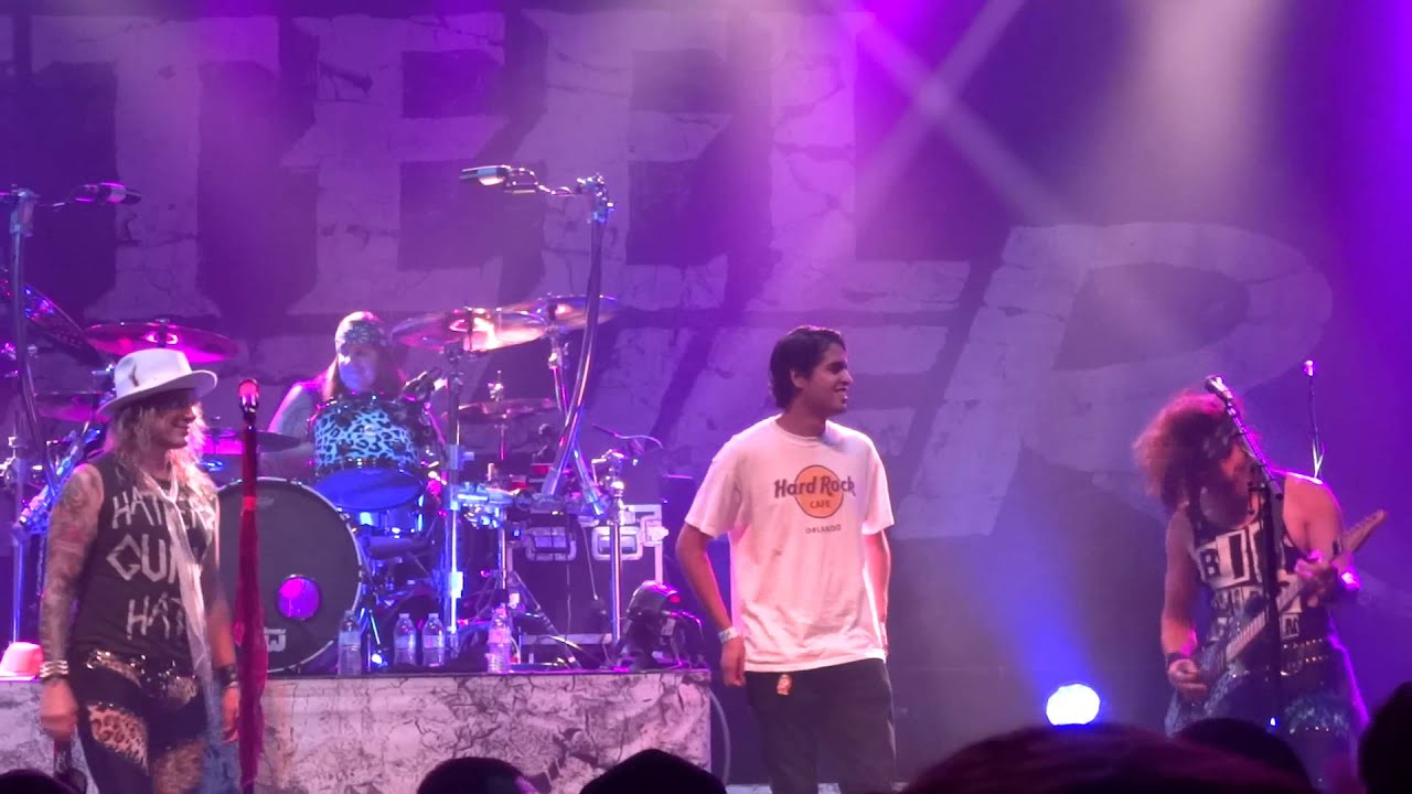 Steel Panther Satchel Owns A Guitar Battle Challenger - Beacham Orlando
