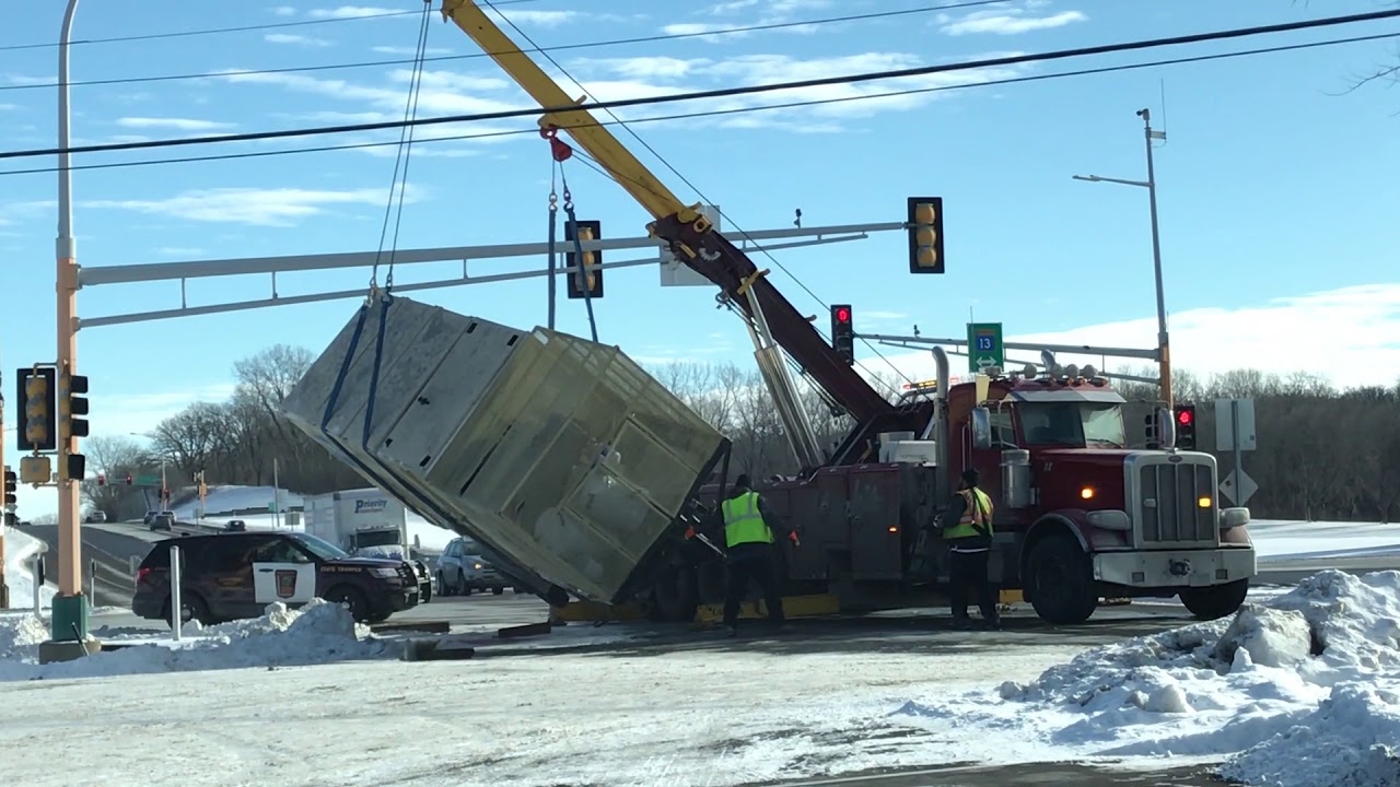Crazy Trailer Tips Over Hwy 13 in Eagan Towed by Marks Towing !