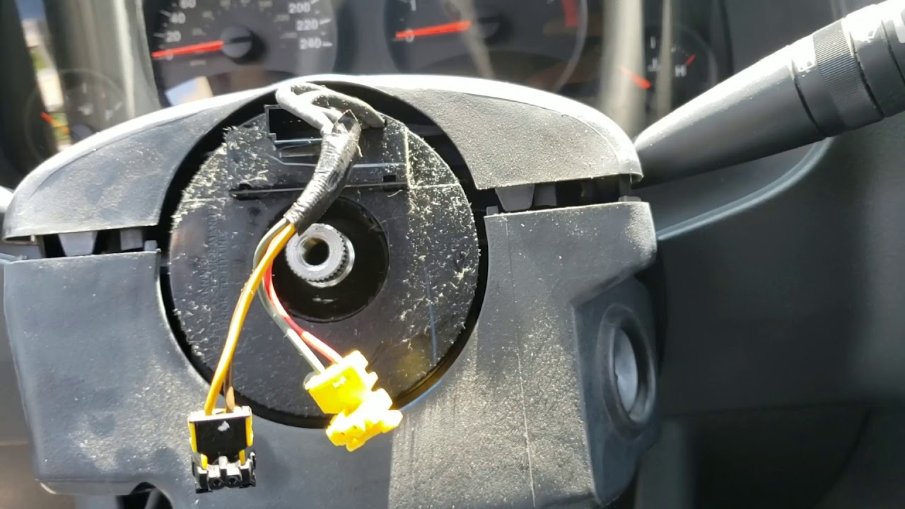 Cambio de resorte de reloj Jeep patriot 2011