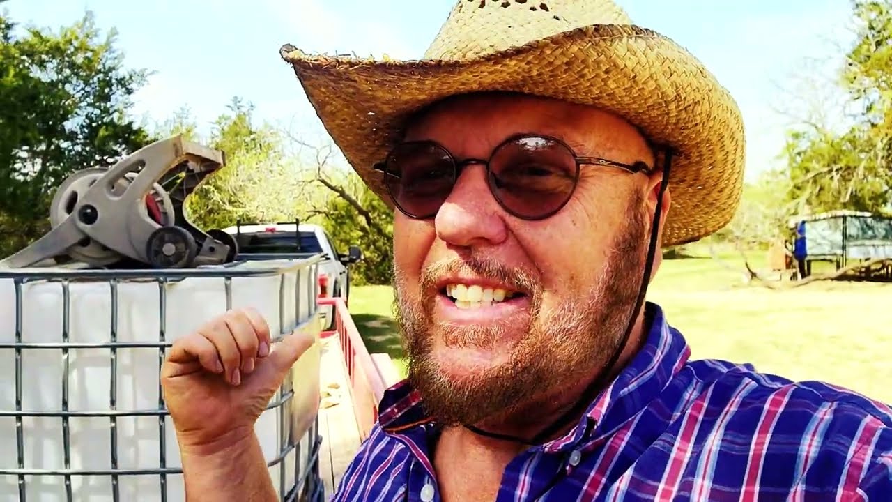 Neighbor gives the gift of water and the shipping container homestead survives dought another month.