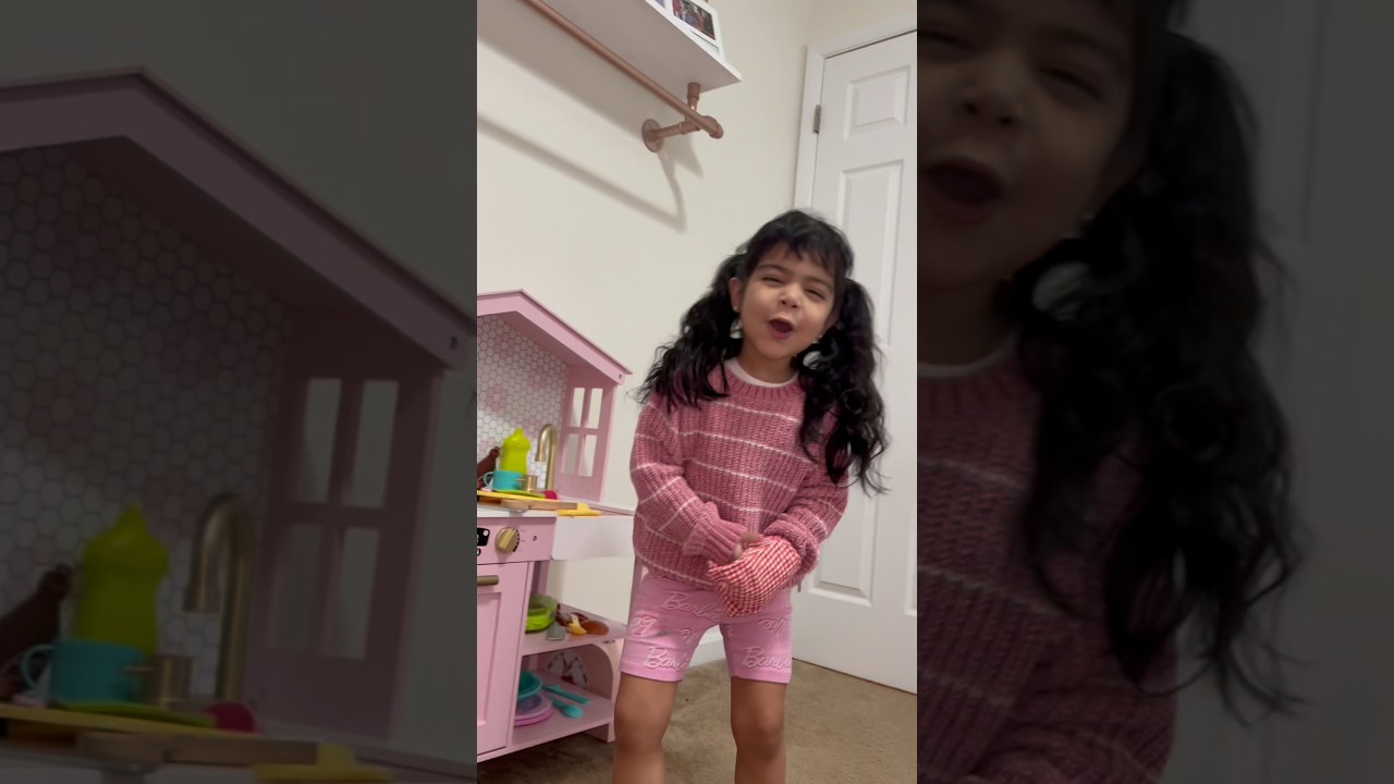 Toddler cooking in the kitchen. 